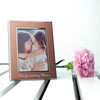 https://www.treatgifts.com/assets/images/catalog-product/personalised-small-rose-gold-metal-photo-frame-per2642-hnd.jpg